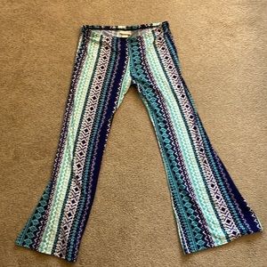 Self esteem youth large patterned multicolored bell bottom leggings.